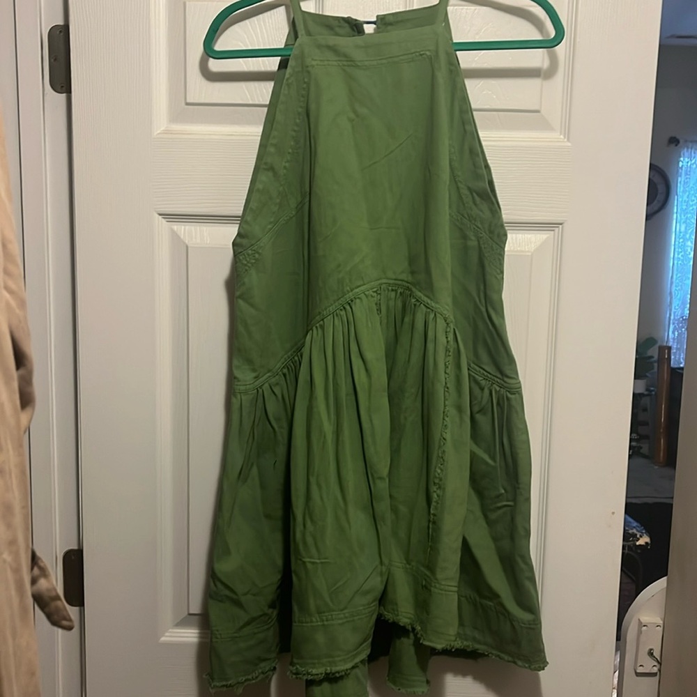 Kelly green “tent-like” dress from Anthropologie.